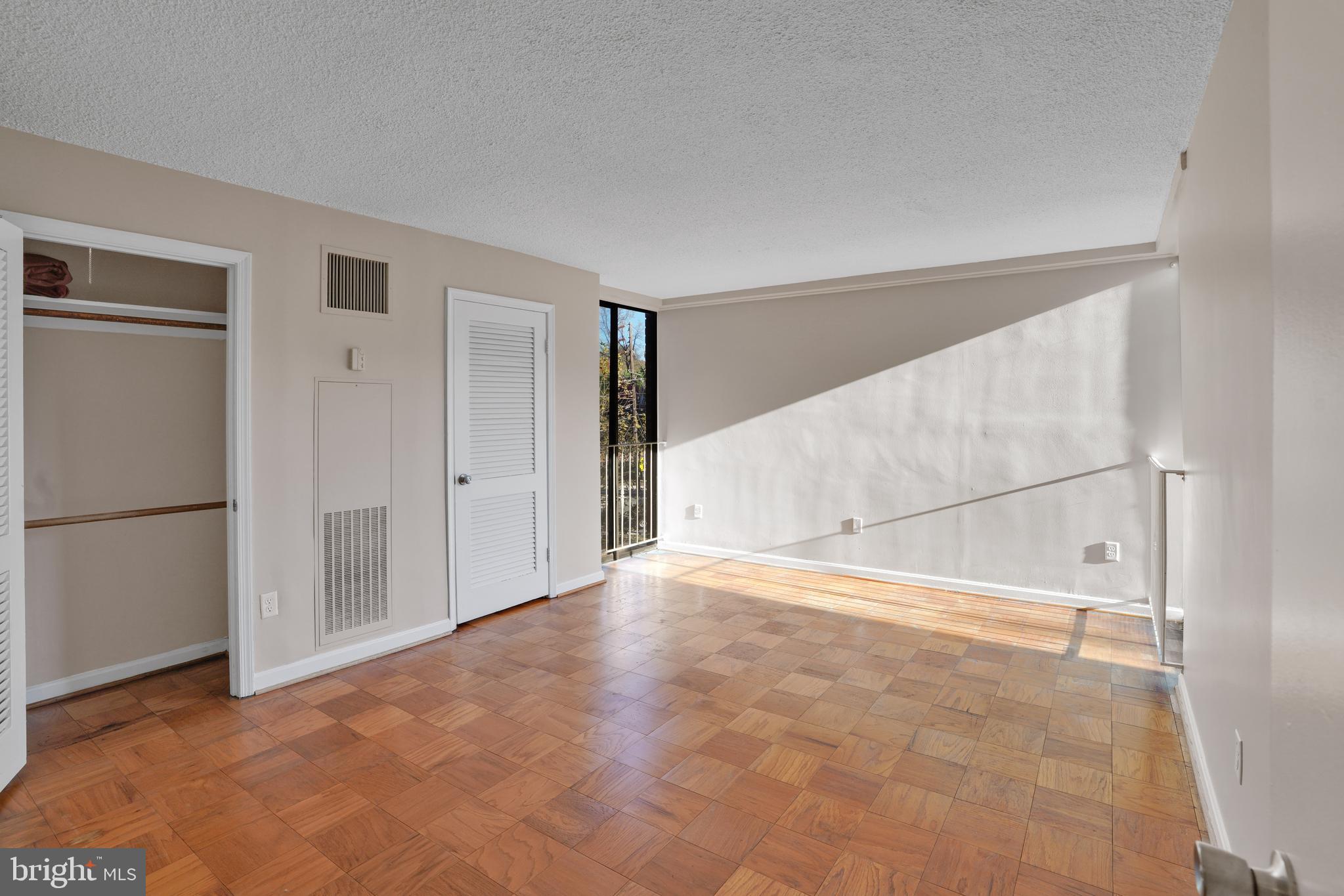 2100 Washington Avenue, Unit 2B Silver Spring, MD 20910 - Photo 19 of 34 a view of an empty room with a window