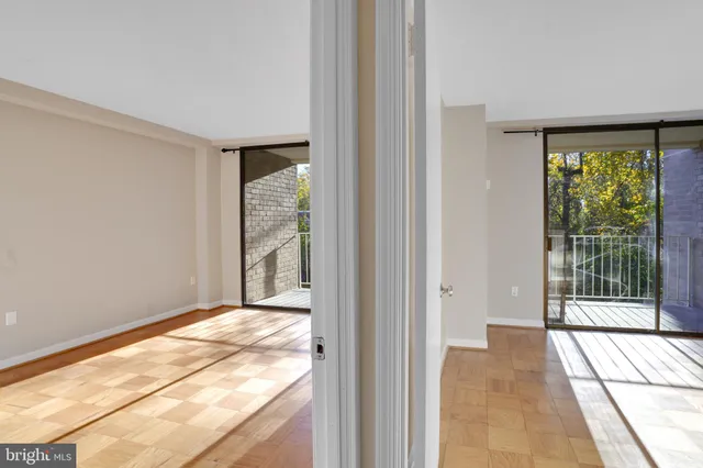 a view of an empty room and window