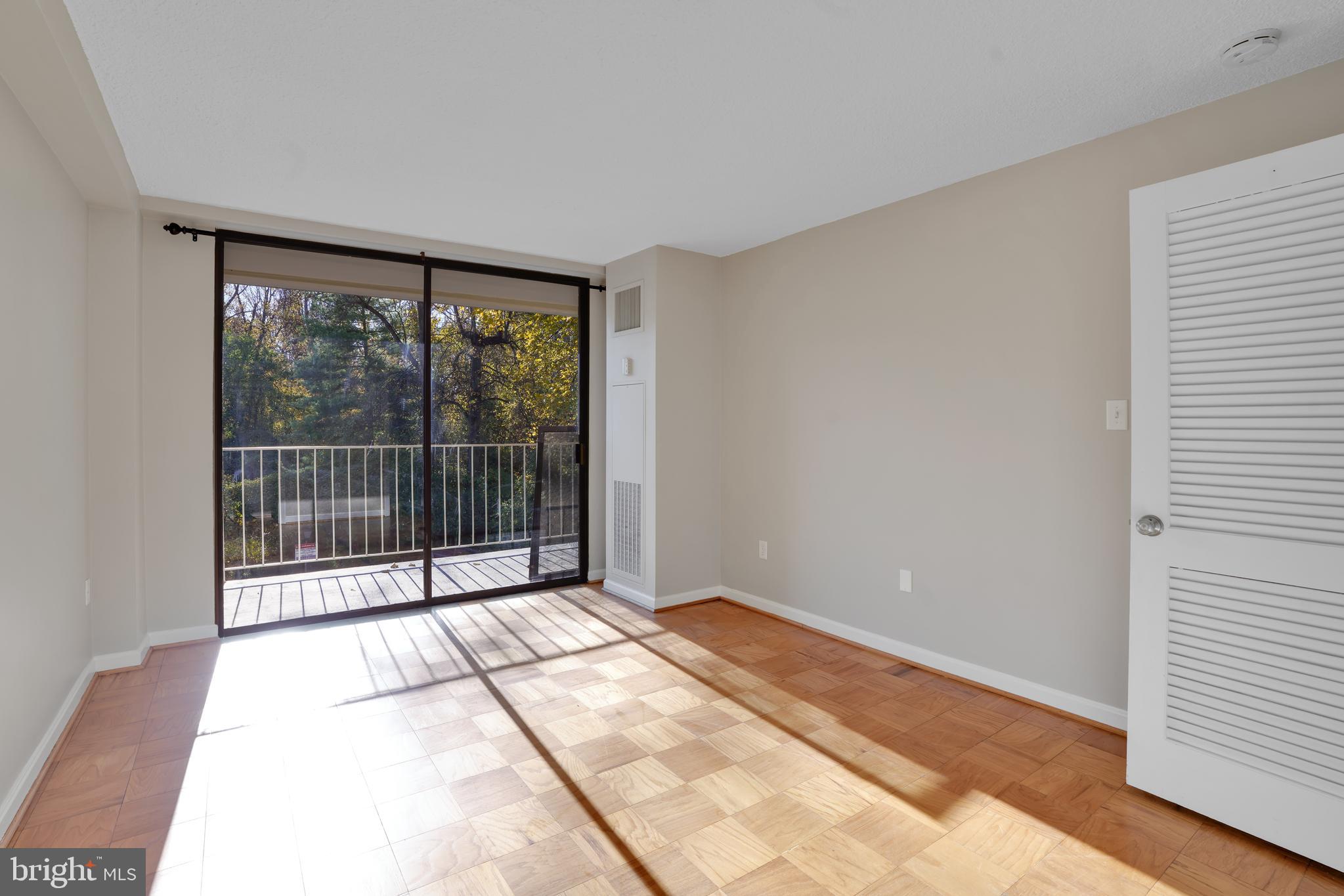 2100 Washington Avenue, Unit 2B Silver Spring, MD 20910 - Photo 27 of 34 a view of a room with sliding glass door