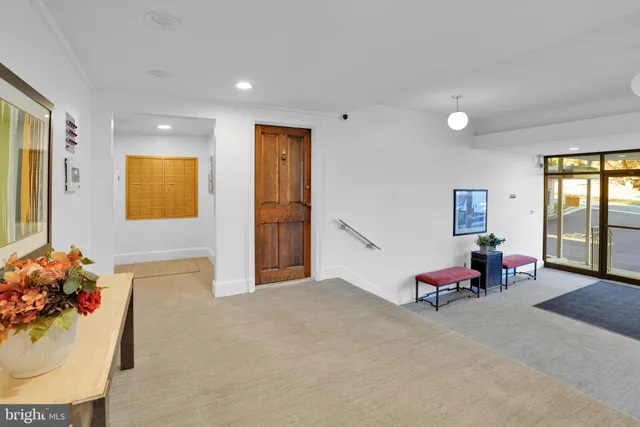 a bedroom with furniture and window