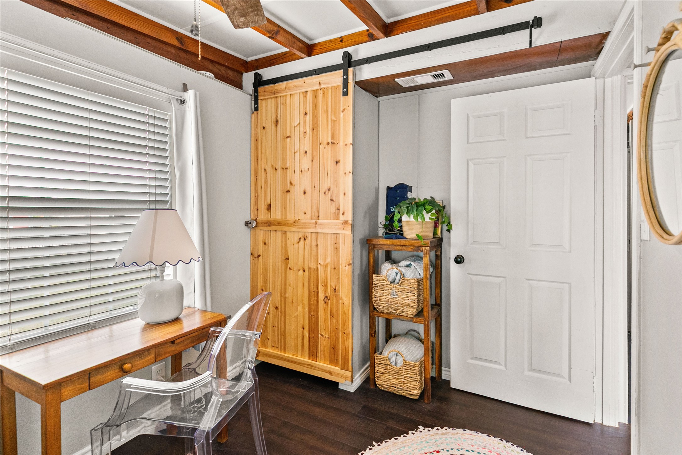 311 Olive Street Surfside Beach, TX 77541 - Photo 20 of 29 a view of an entryway with wooden floor