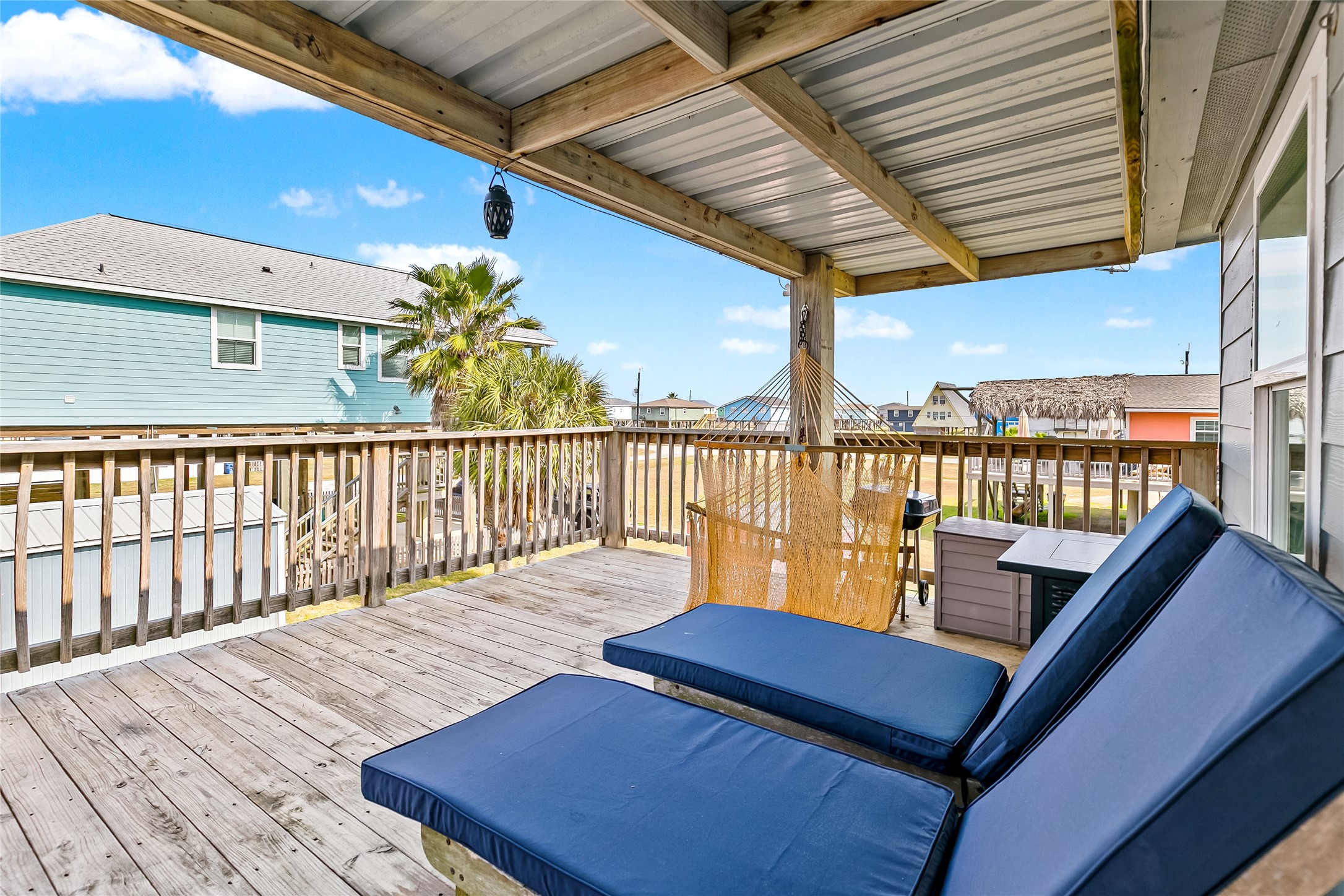 311 Olive Street Surfside Beach, TX 77541 - Photo 23 of 29 a view of a balcony with wooden floor