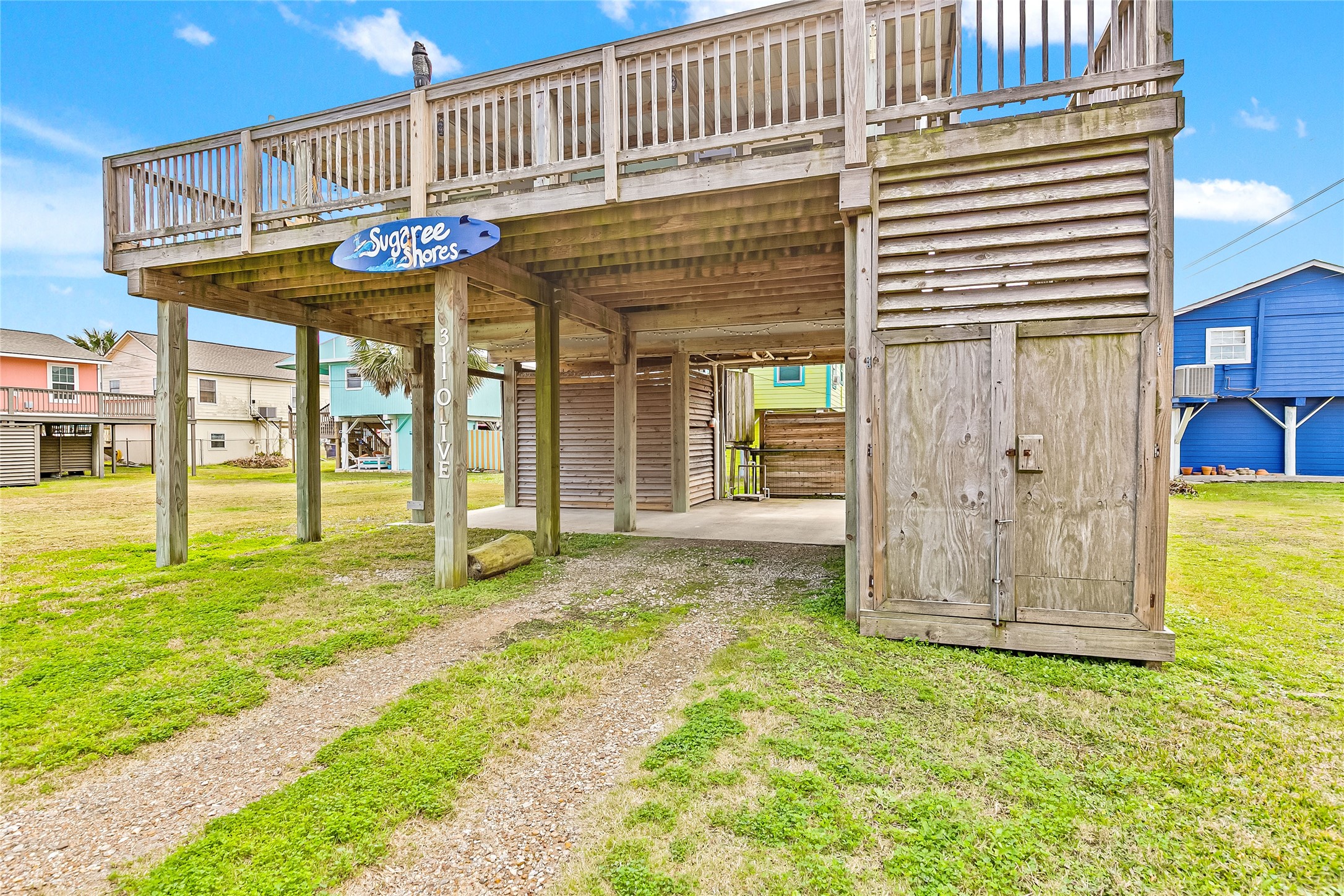 311 Olive Street Surfside Beach, TX 77541 - Photo 26 of 29 a view of a house with a outdoor space