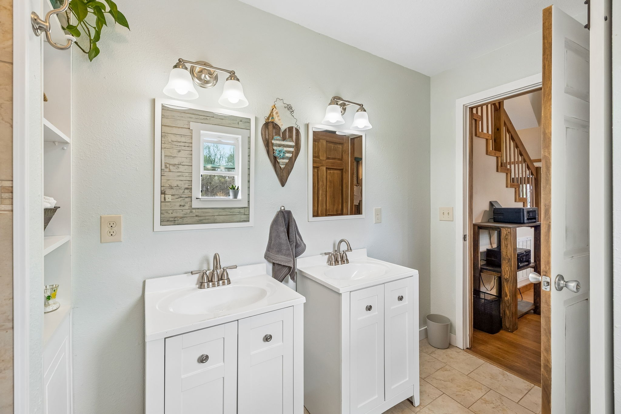 95 Floyd Lane Decherd, TN 37324 - Photo 14 of 82 a bathroom with a sink a vanity and a mirror