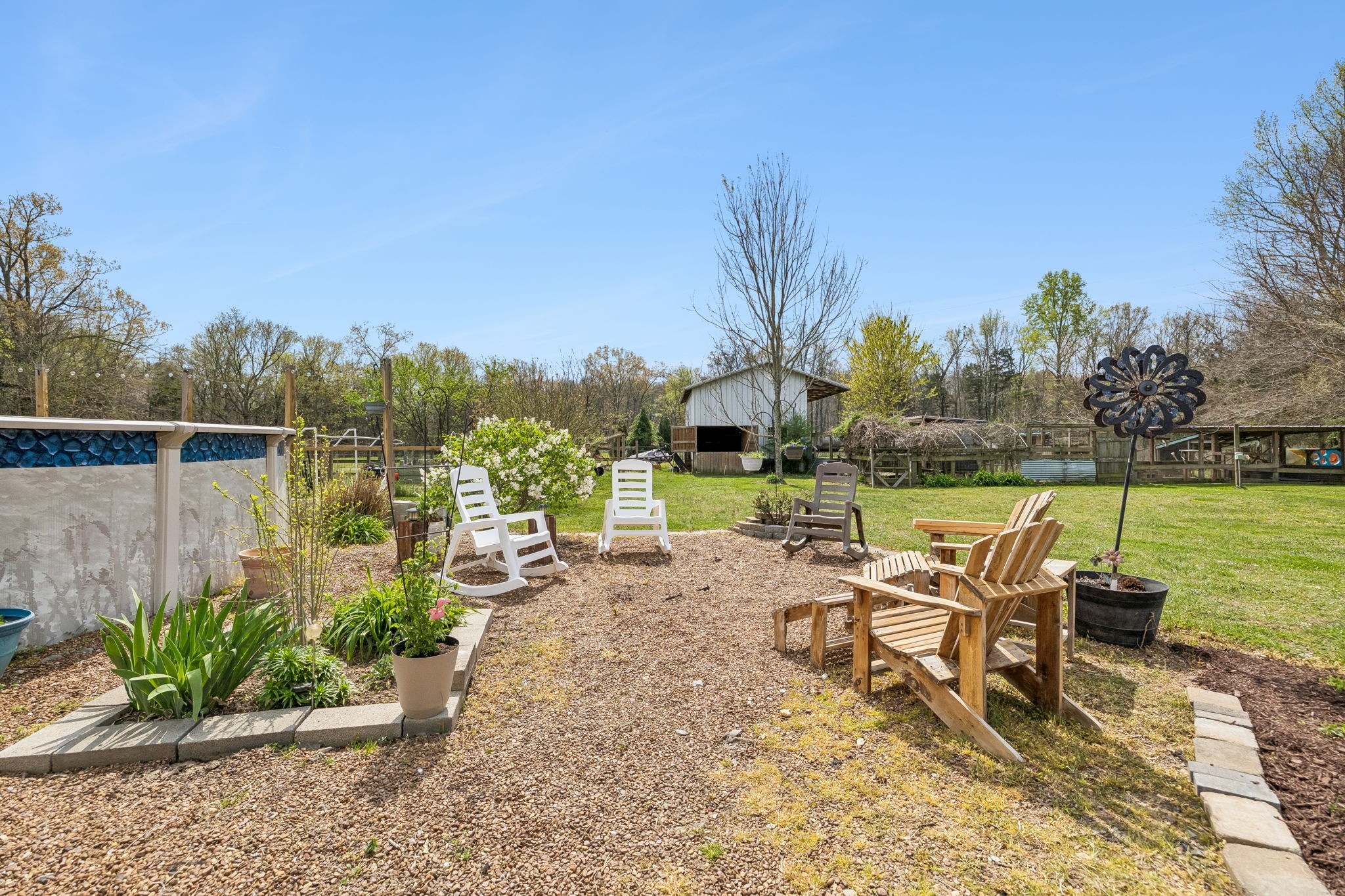95 Floyd Lane Decherd, TN 37324 - Photo 47 of 82 a view of a lake with a table and chairs under an umbrella
