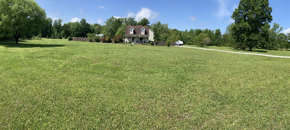 95 Floyd Lane Decherd, TN 37324 - Photo 75 of 82 a backyard of a house with lots of green space