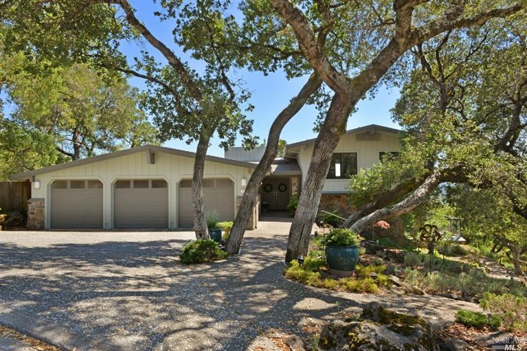 1824 Happy Valley Road Santa Rosa, CA 95404 - Photo 1 of 1 a front view of a house with a yard and tree s