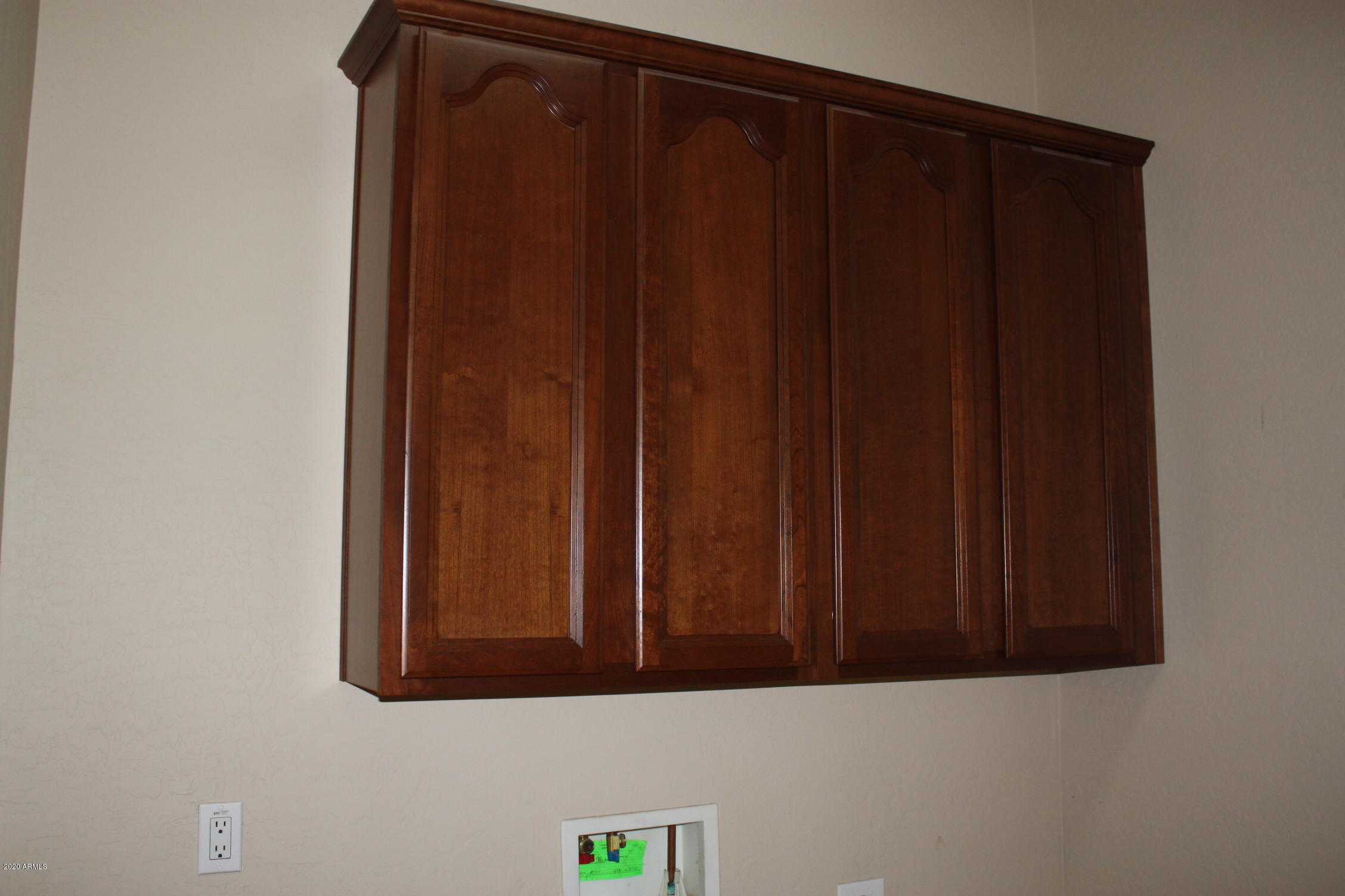 7009 West Fremont Road Laveen, AZ 85339 - Photo 52 of 64 Laundry Cherry Cholcoate Tahoe cabinets