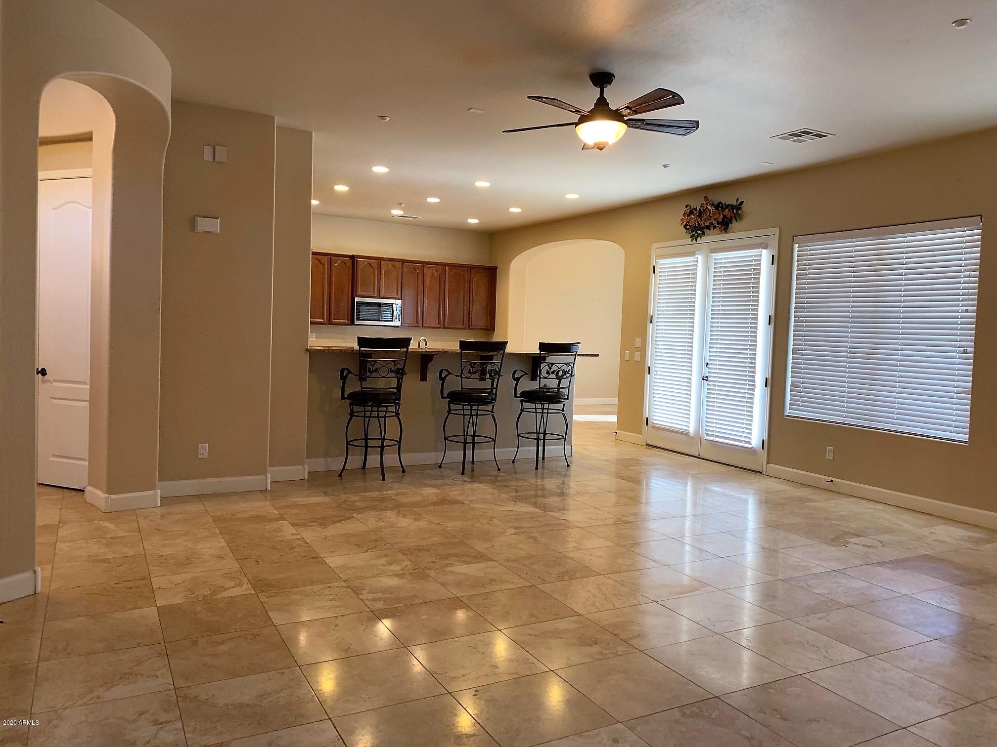 7009 West Fremont Road Laveen, AZ 85339 - Photo 10 of 64 Family room view to kitchen