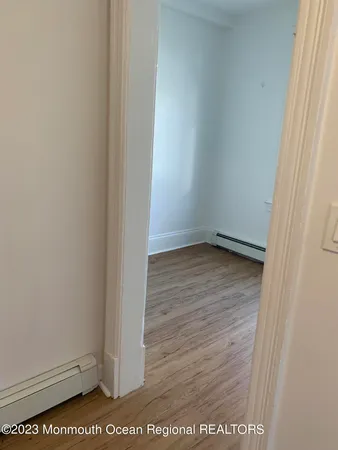 a view of a room that has a window