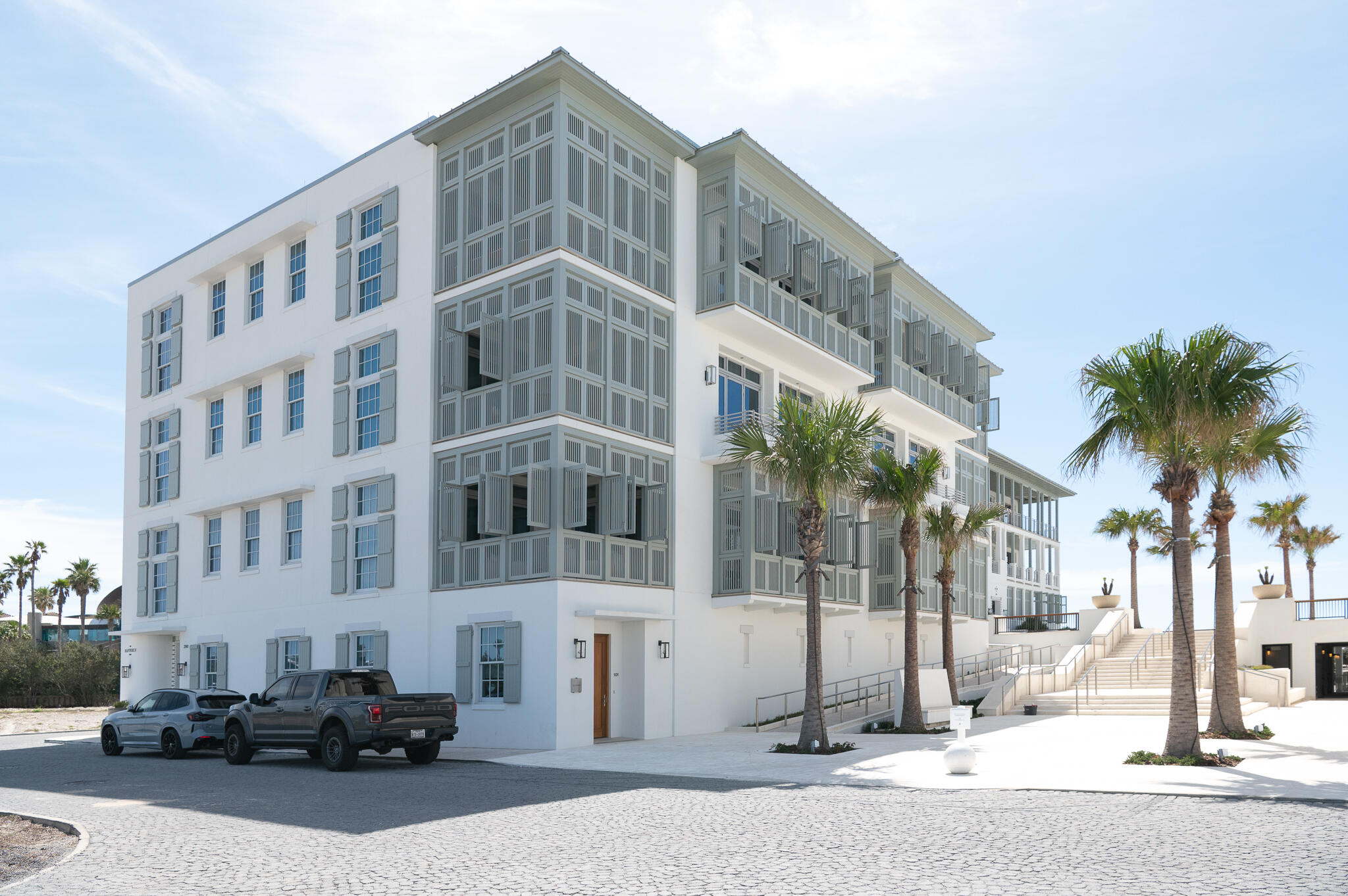 290 Sea Garden St Inlet Beach, Unit 201 Inlet Beach, FL 32461 - Photo 4 of 49 a front view of a building with a street