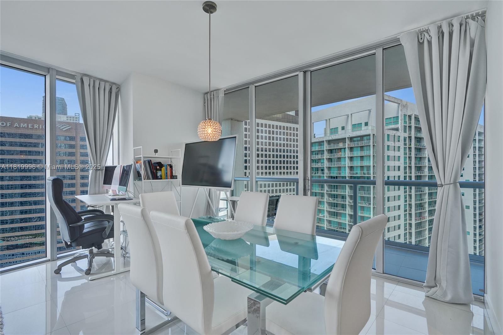 485 Brickell Avenue, Unit 3608 Miami, FL 33131 - Photo 3 of 43 a view of a dining room with furniture