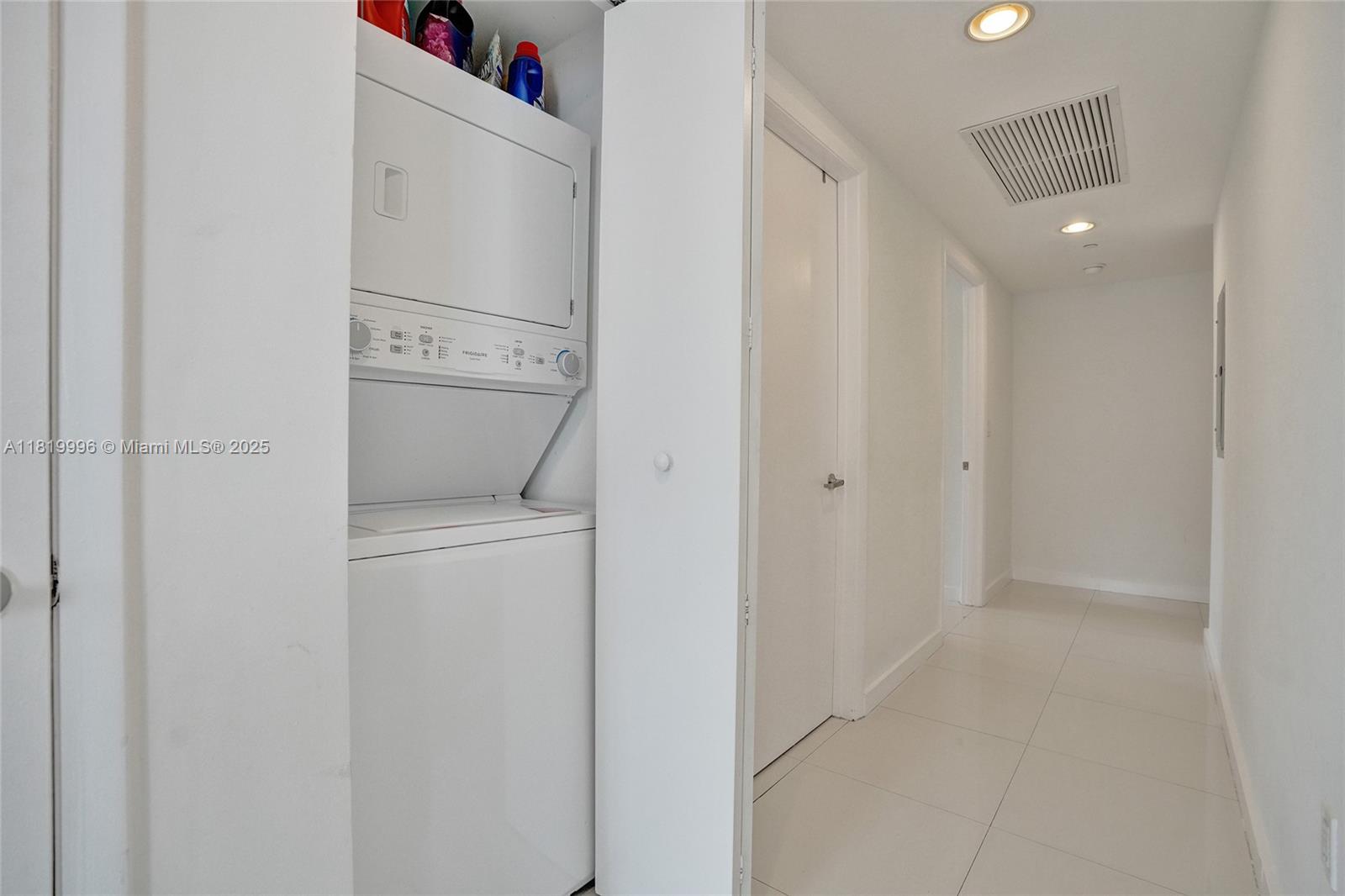 485 Brickell Avenue, Unit 3608 Miami, FL 33131 - Photo 31 of 43 a view of storage and utility room with washer and dryer
