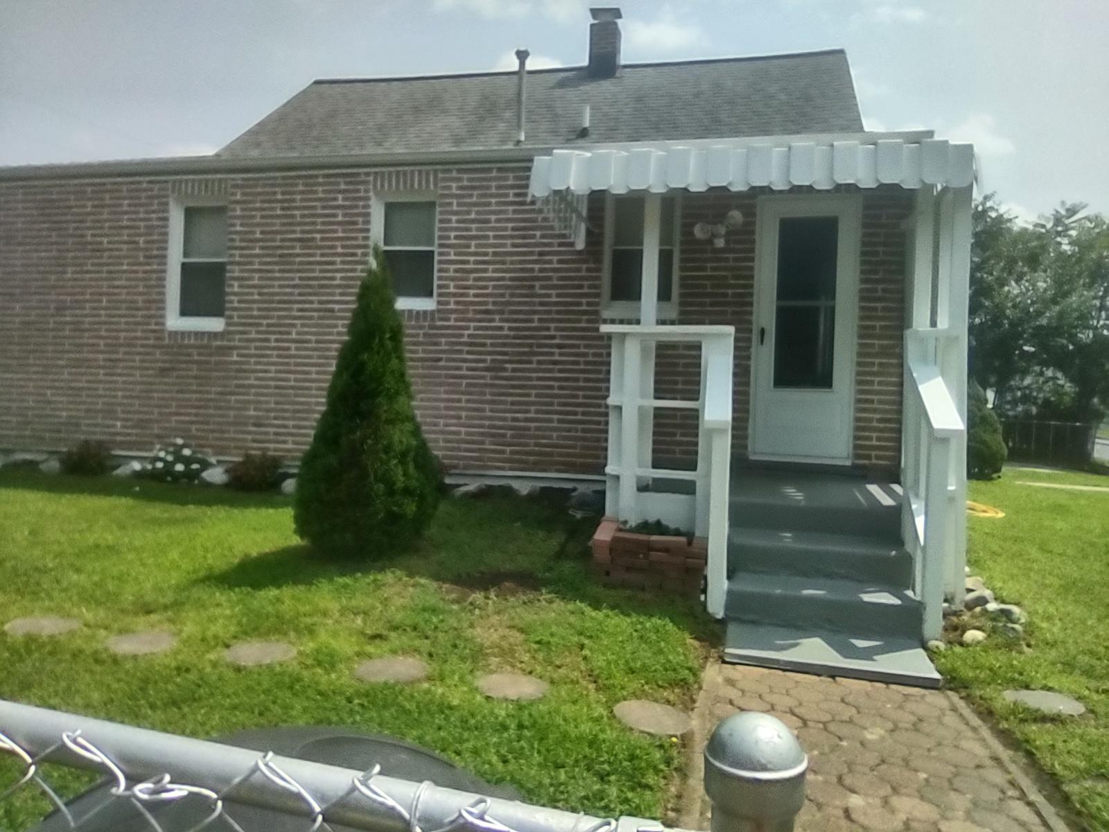 15 Riverside Road Baltimore, MD 21221 - Photo 2 of 6 House side door brick home