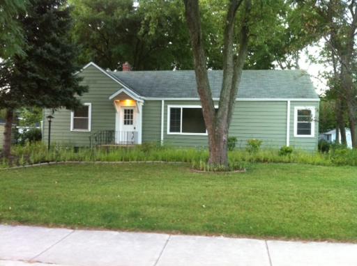 1339 183rd Street Homewood, IL 60430 - Photo 2 of 16 a front view of a house with a yard