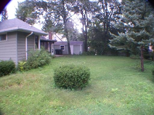 1339 183rd Street Homewood, IL 60430 - Photo 3 of 16 a backyard of a house with lots of green space