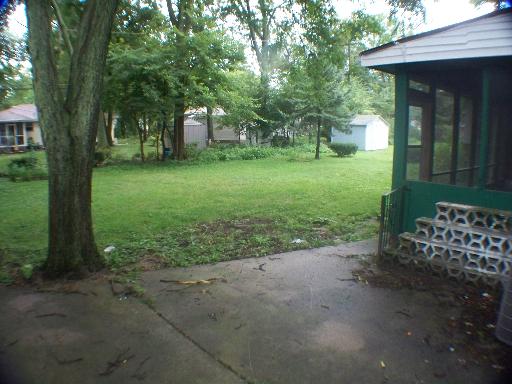 1339 183rd Street Homewood, IL 60430 - Photo 4 of 16 a view of a house with backyard and a tree