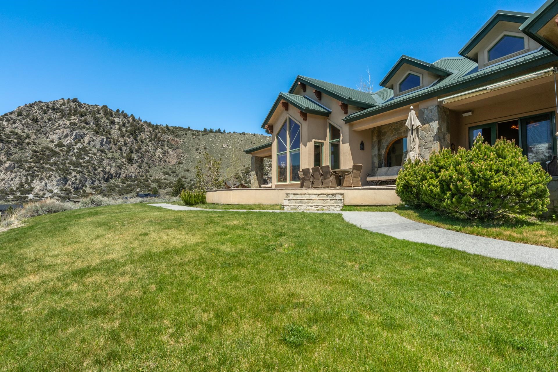 45 Skyline Road June Lake, CA 93529 - Photo 53 of 58 a front view of a house with garden