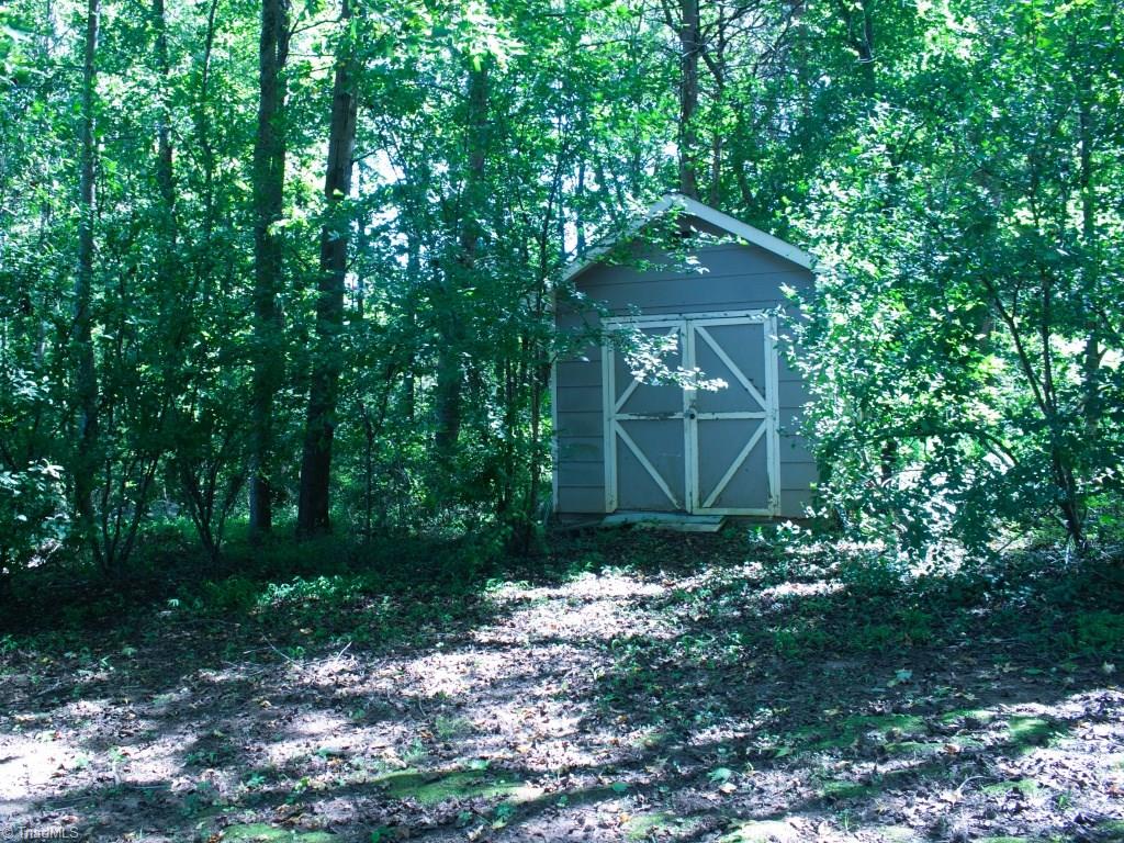 5268 Williard Road Oak Ridge, NC 27310 - Photo 34 of 44 Storage Building Stays With The Home