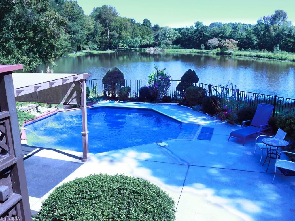 5268 Williard Road Oak Ridge, NC 27310 - Photo 8 of 44 View of Pool and Pond