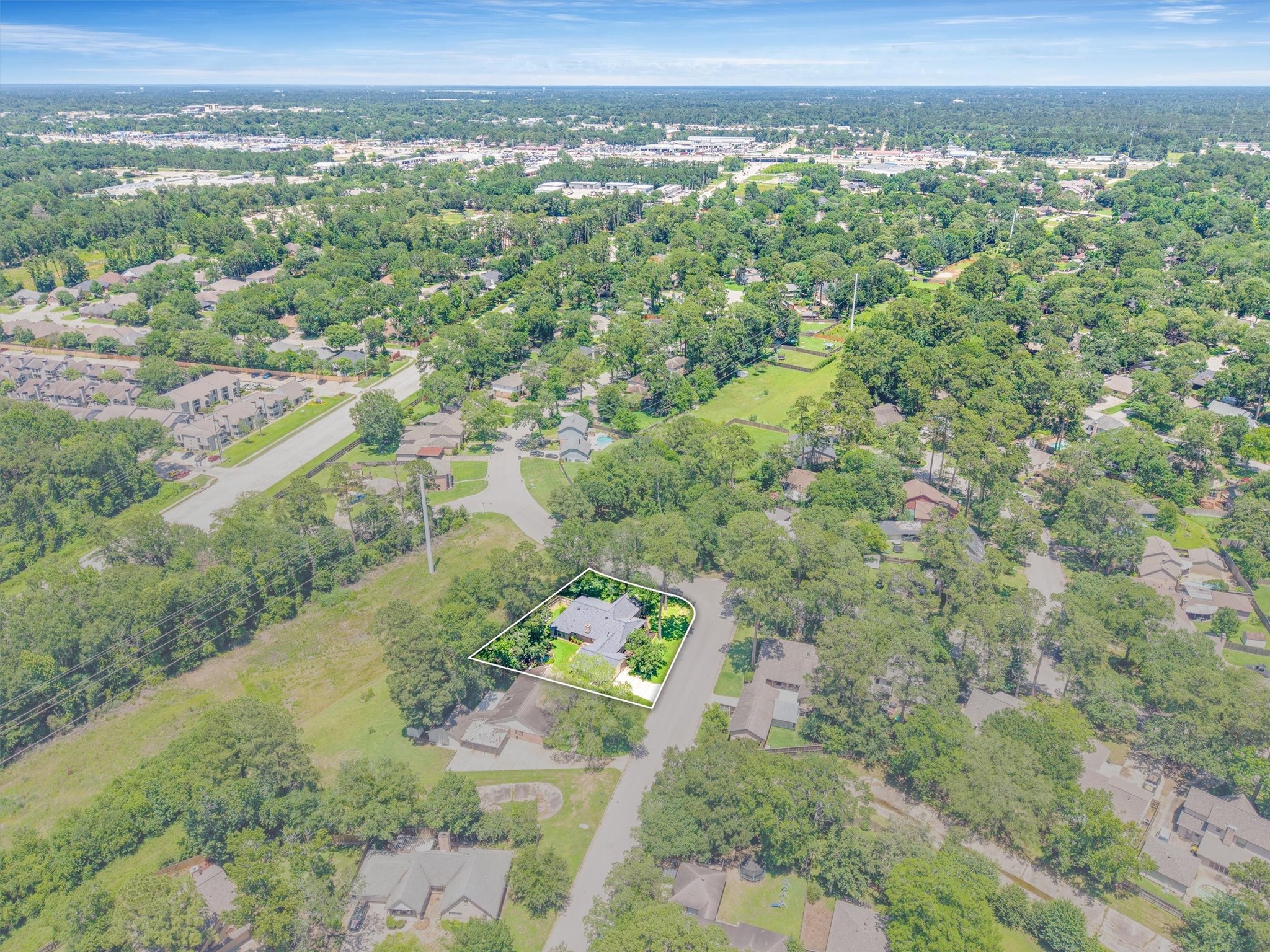 826 North Rivershire Drive Conroe, TX 77304 - Photo 43 of 46 From up here, the location story writes itself. Tucked inside the tree-lined streets of Rivershire, this home sits within easy reach of I-45, Loop 336, and all the shopping, dining, and conveniences Conroe has to offer, while still feeling like a world away from all of it.