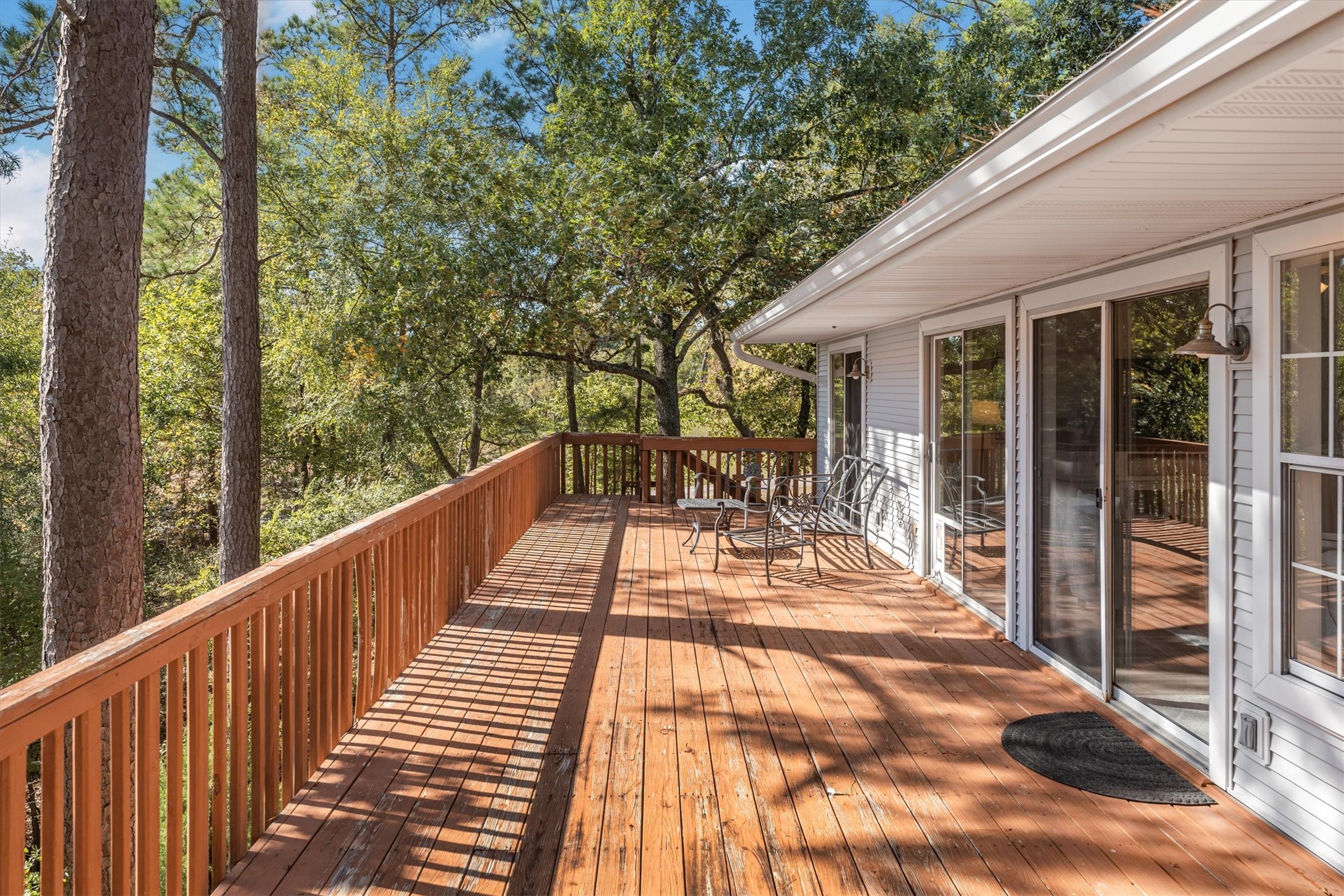 123 Palisade Circle Huntsville, TX 77320 - Photo 11 of 50 a view of balcony with wooden floor and fence