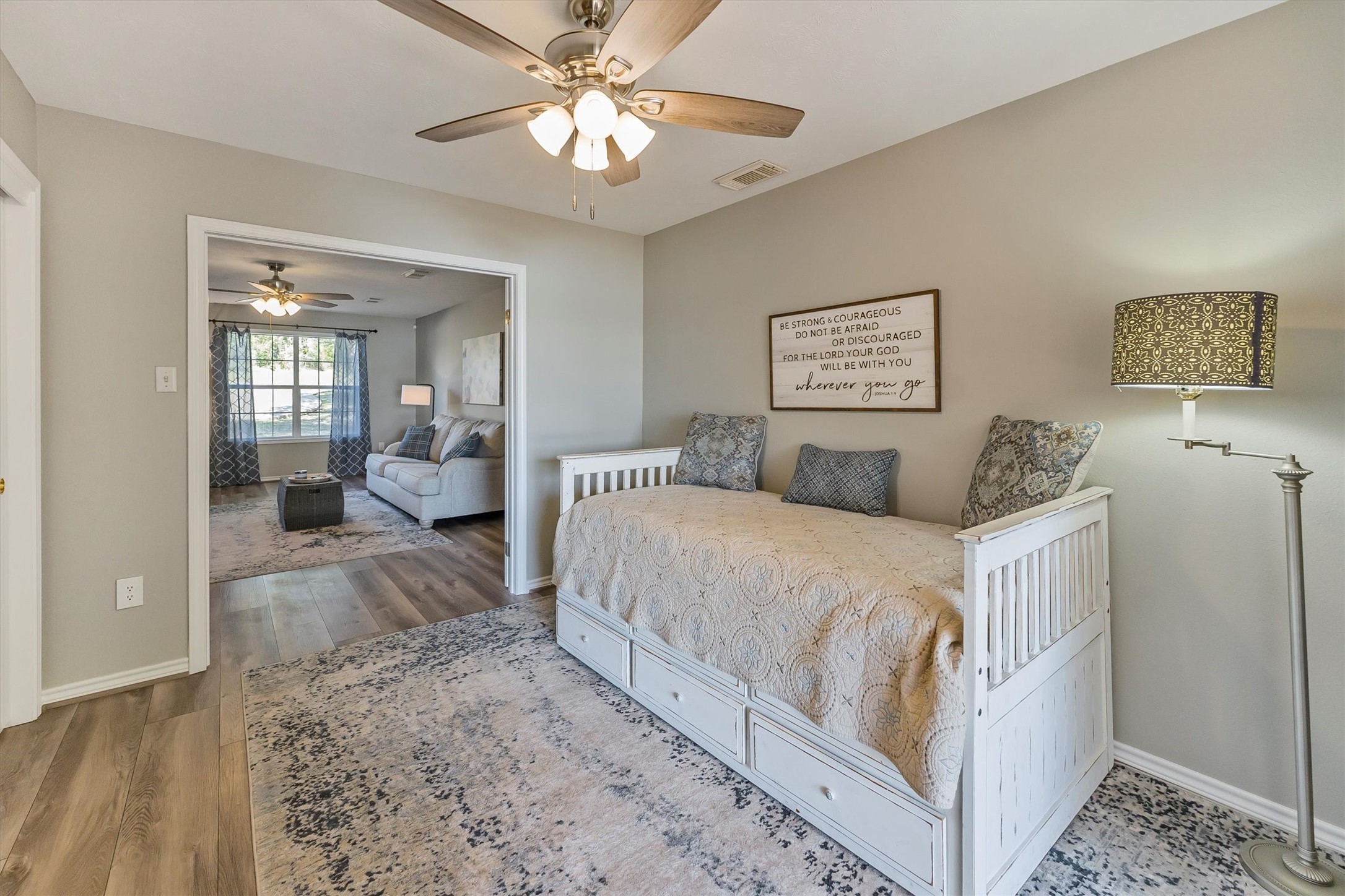123 Palisade Circle Huntsville, TX 77320 - Photo 18 of 50 a spacious bedroom with a bed and a walk in closet