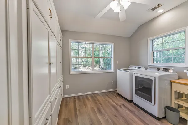 a view of a kitchen with washer and dryer