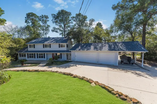 a house view with a garden space