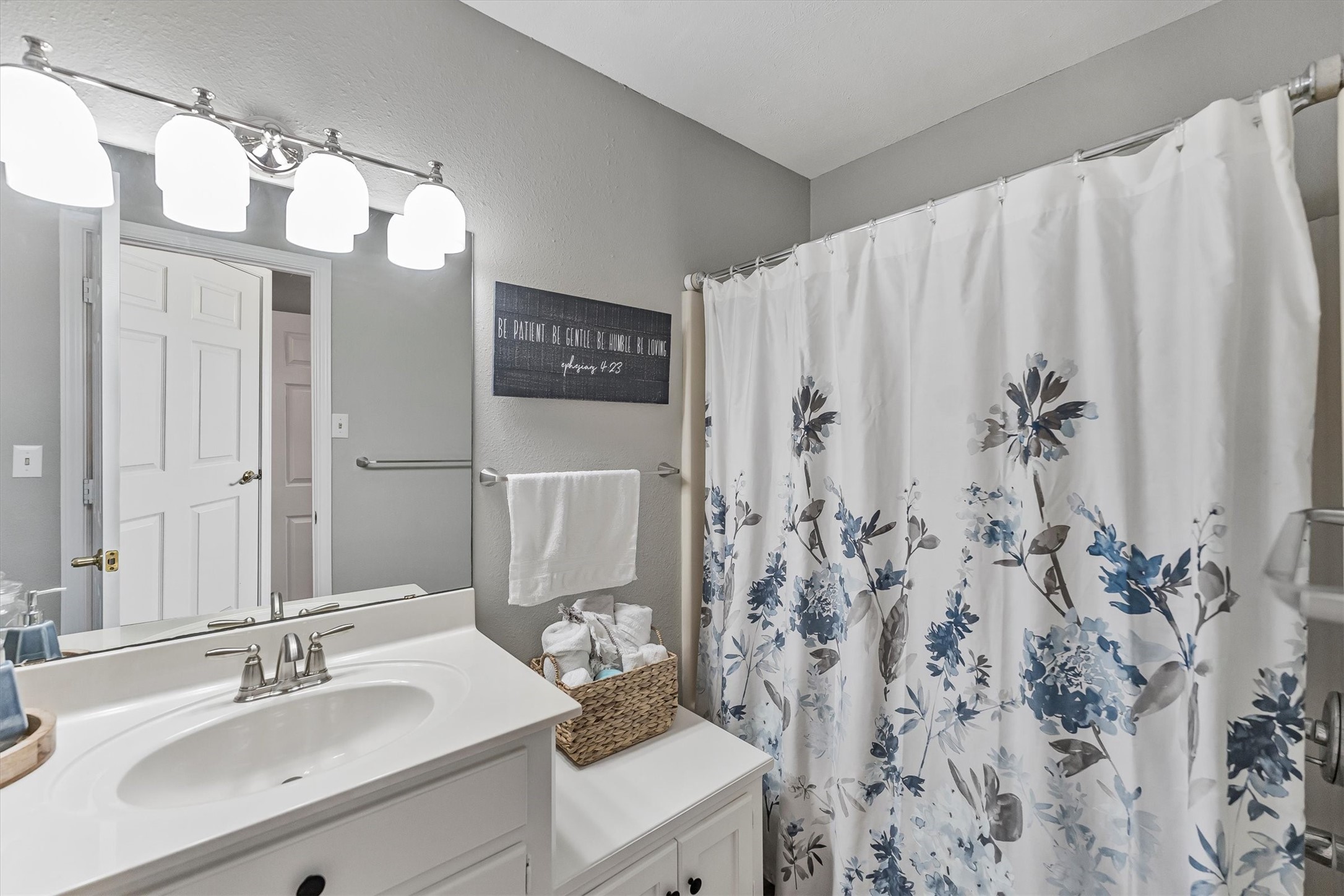 123 Palisade Circle Huntsville, TX 77320 - Photo 25 of 50 a bathroom with a sink and a mirror
