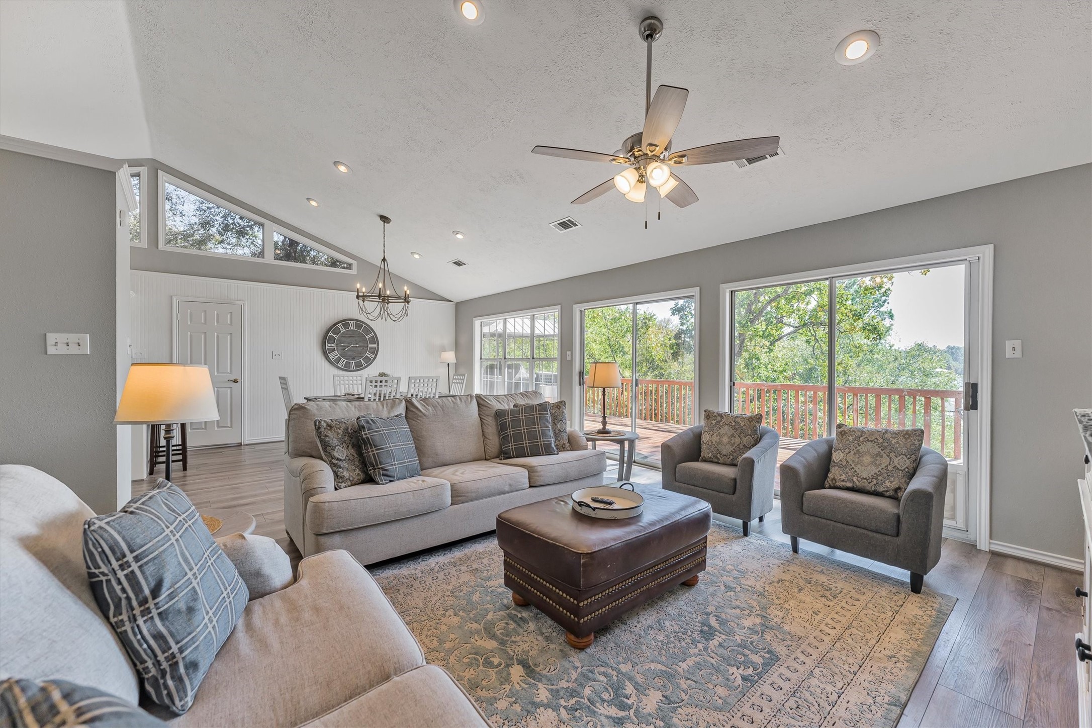 123 Palisade Circle Huntsville, TX 77320 - Photo 31 of 50 a living room with furniture ceiling fan and a rug