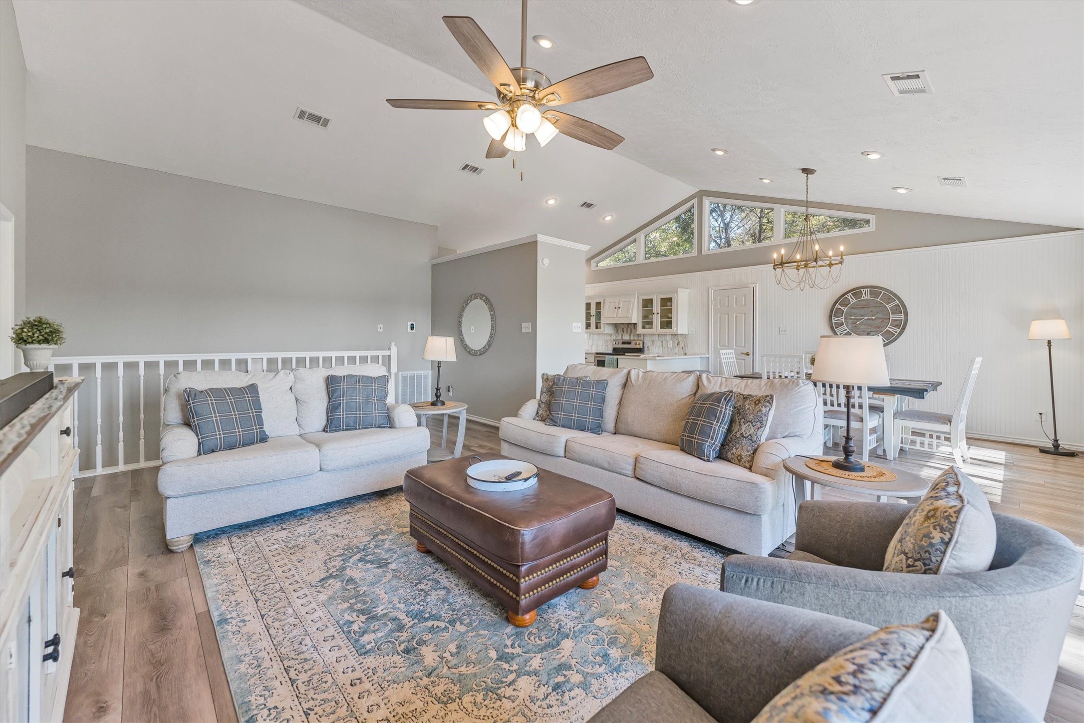123 Palisade Circle Huntsville, TX 77320 - Photo 32 of 50 a living room with furniture ceiling fan and a rug