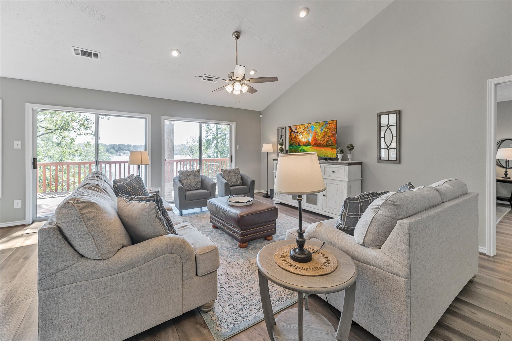 123 Palisade Circle Huntsville, TX 77320 - Photo 33 of 50 a living room with furniture and a flat screen tv
