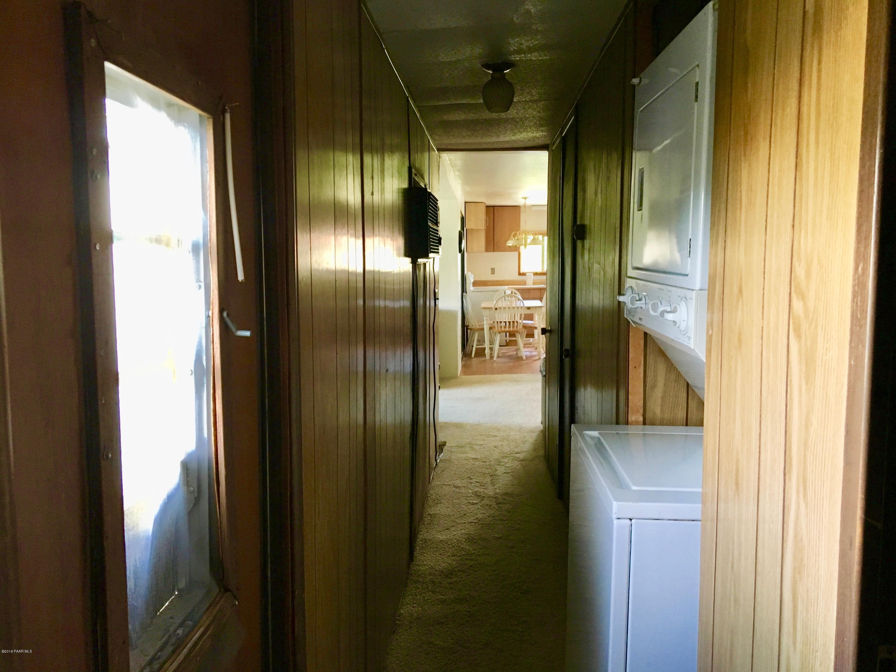 7375 North Race Track Road Prescott, AZ 86305 - Photo 25 of 45 looking down hall from master