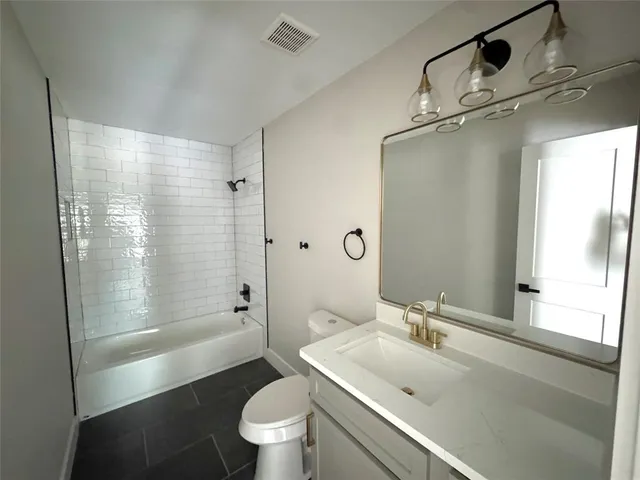 a view of a house with a garage