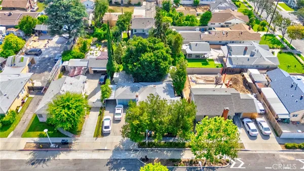 an aerial view of a house with a garden