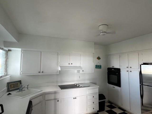 1900 South Ocean Drive, Unit 712 Fort Lauderdale, FL 33316 - Photo 10 of 25 a kitchen with a sink appliances and cabinets