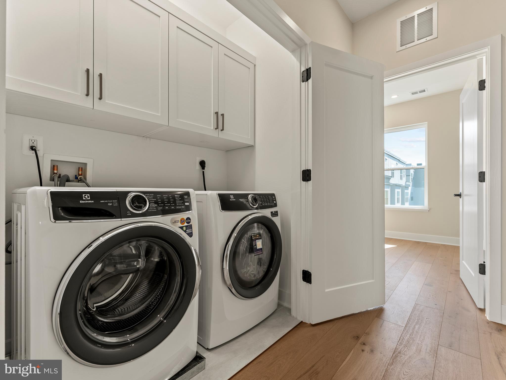 2015 Tysons Ridgeline Road Falls Church, VA 22043 - Photo 22 of 33 a utility room with dryer and washer