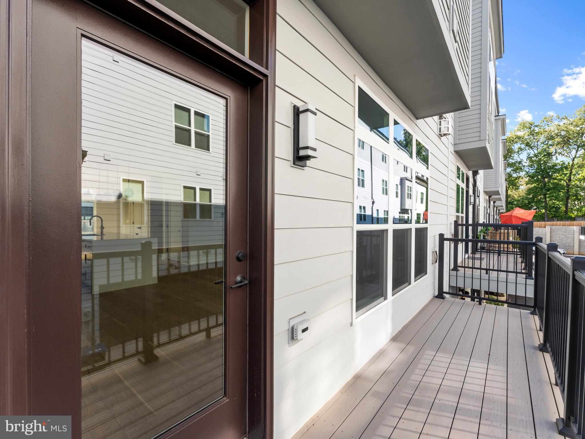 2015 Tysons Ridgeline Road Falls Church, VA 22043 - Photo 32 of 33 a view of a balcony with wooden floor
