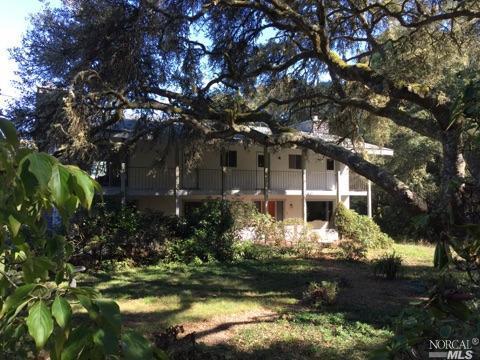 69 Drakes Summit Road Inverness, CA 94956 - Photo 1 of 1 a view of a house with a yard