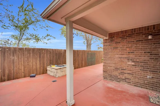 a view of a house with a patio