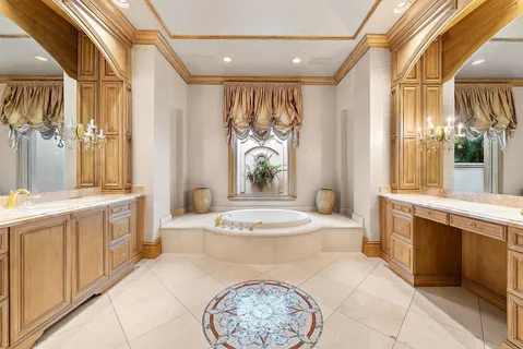 a bathroom with a tub and shower