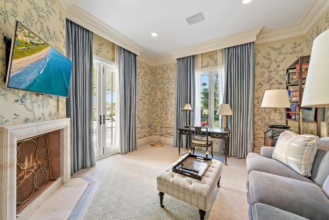 a bathroom with a sink a mirror and a shower