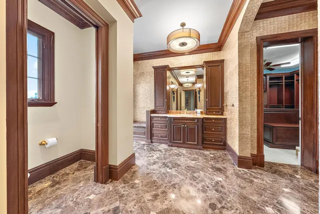 a room with furniture and a ceiling fan