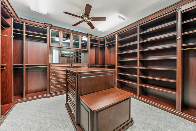 a view of a livingroom with furniture and a window