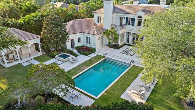 a aerial view of a house with swimming pool