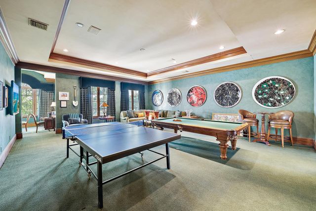 a bathroom with a granite countertop sink mirror and double