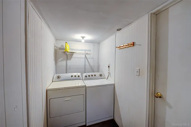 a utility room with dryer and washer