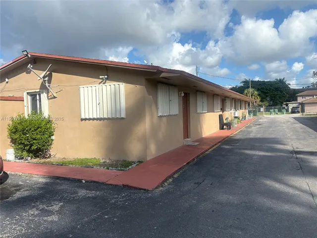 a view of backyard of a house