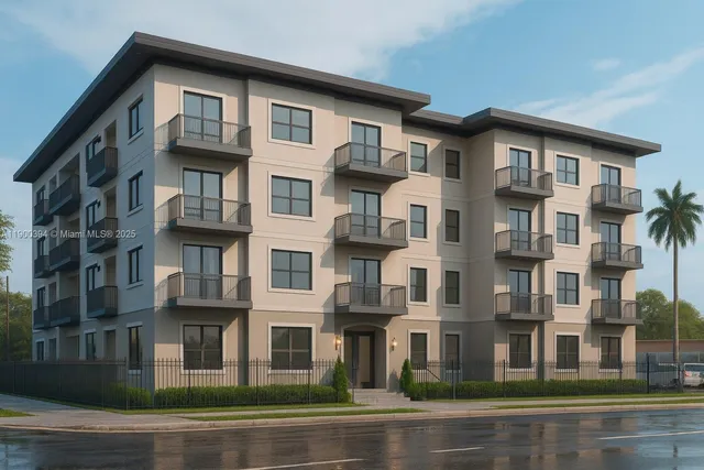 a front view of a residential apartment building with a yard